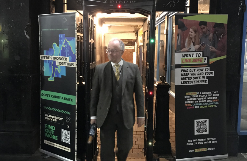 Rupert Matthews passes through a knife arch in Leicester city centre